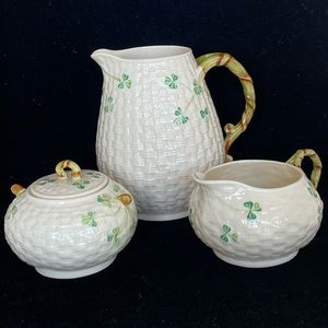Belleek Pottery  pitcher, creamer and sugar bowl.